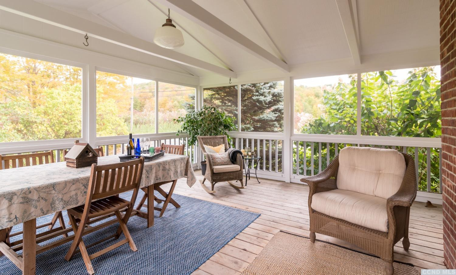 56 Beebe Pond Road Canaan, NY 12029 - Photo 27 of 50 a living room with furniture and a large window