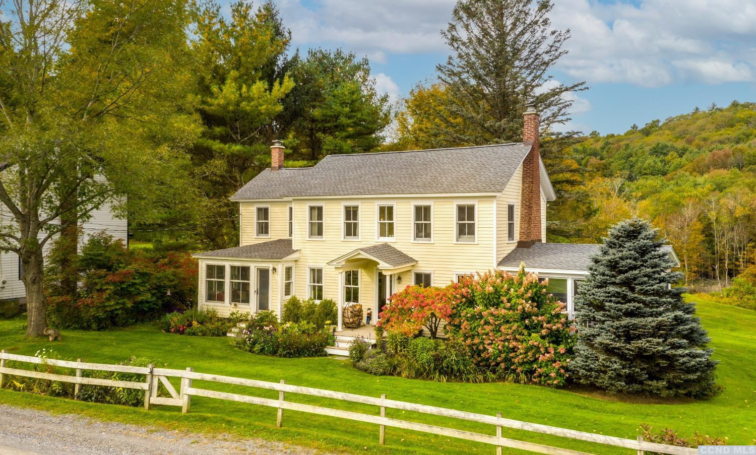 56 Beebe Pond Road Canaan, NY 12029 - Photo 29 of 50 a front view of a house with a yard