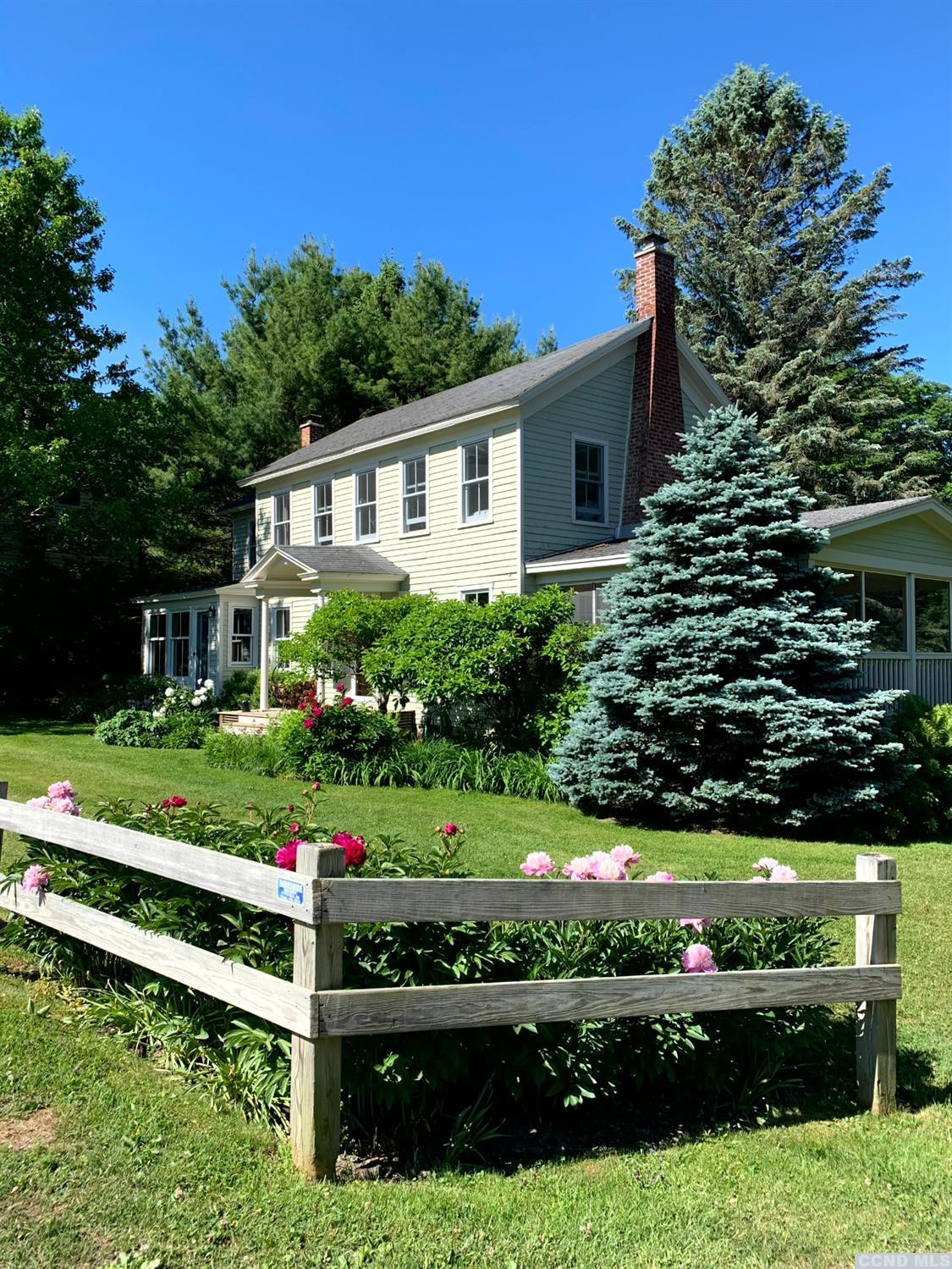 56 Beebe Pond Road Canaan, NY 12029 - Photo 33 of 50 a front view of a house with a yard