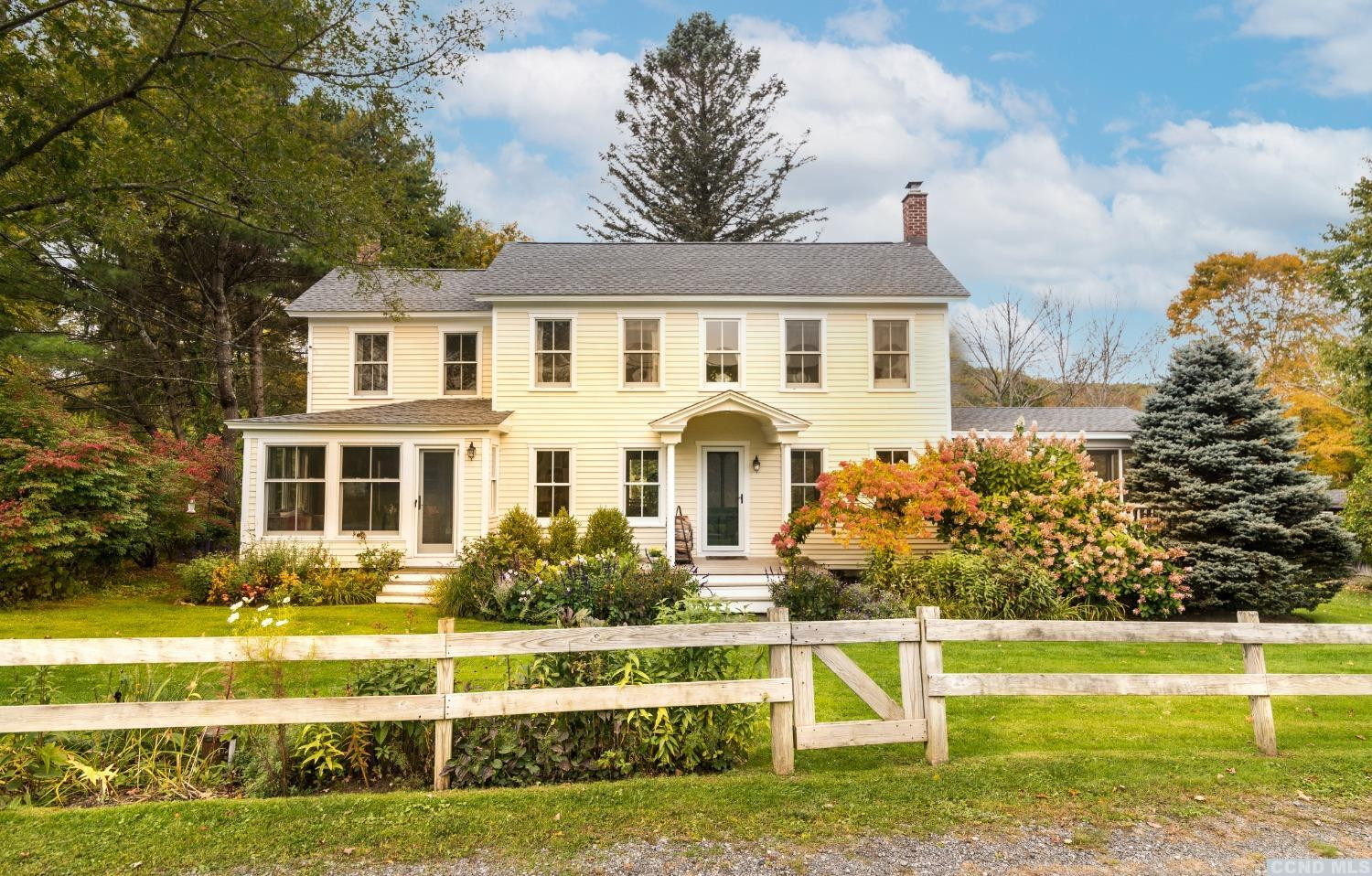 56 Beebe Pond Road Canaan, NY 12029 - Photo 47 of 50 a front view of a house with a garden