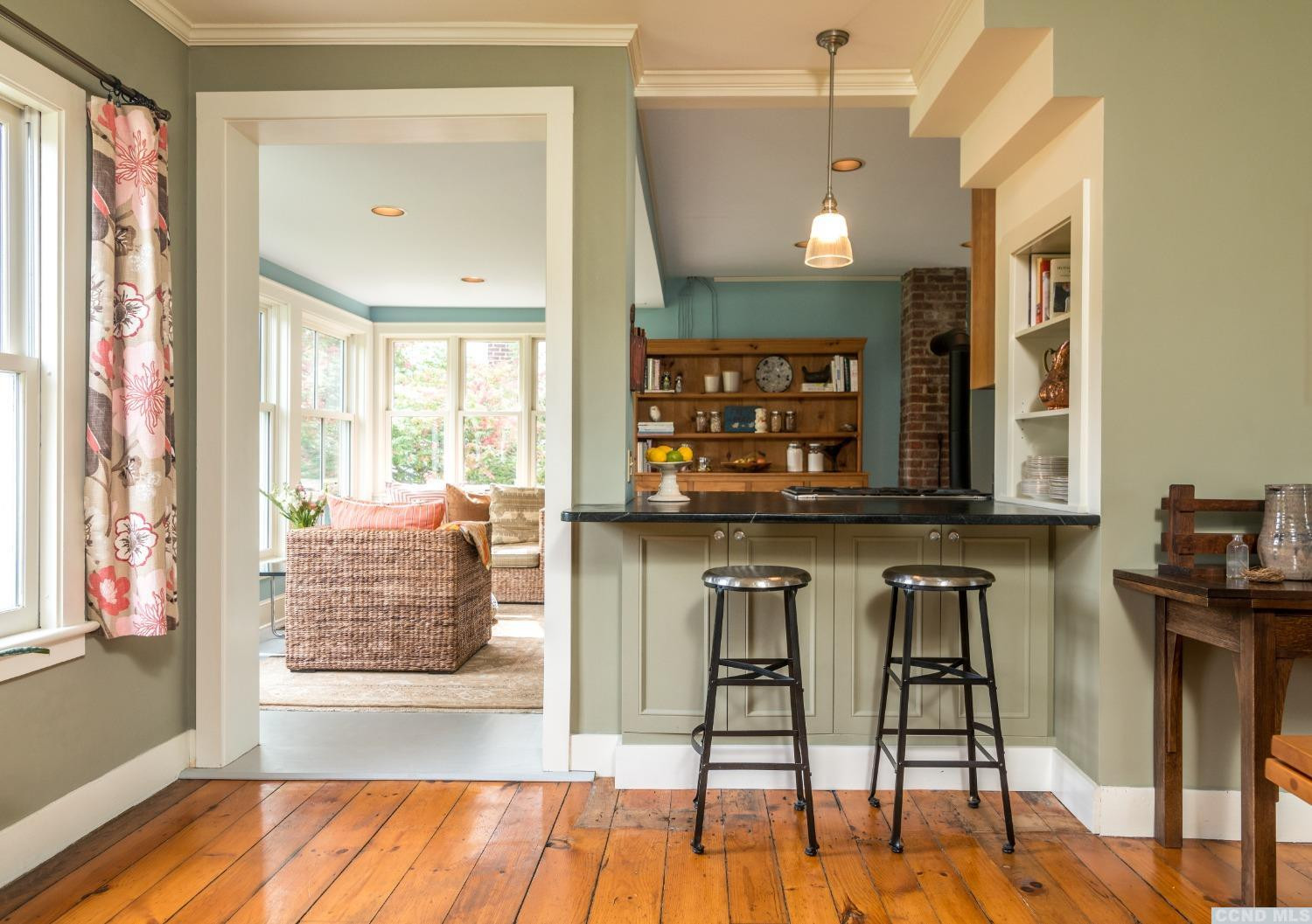 56 Beebe Pond Road Canaan, NY 12029 - Photo 9 of 50 a view of a room with wooden floor and windows
