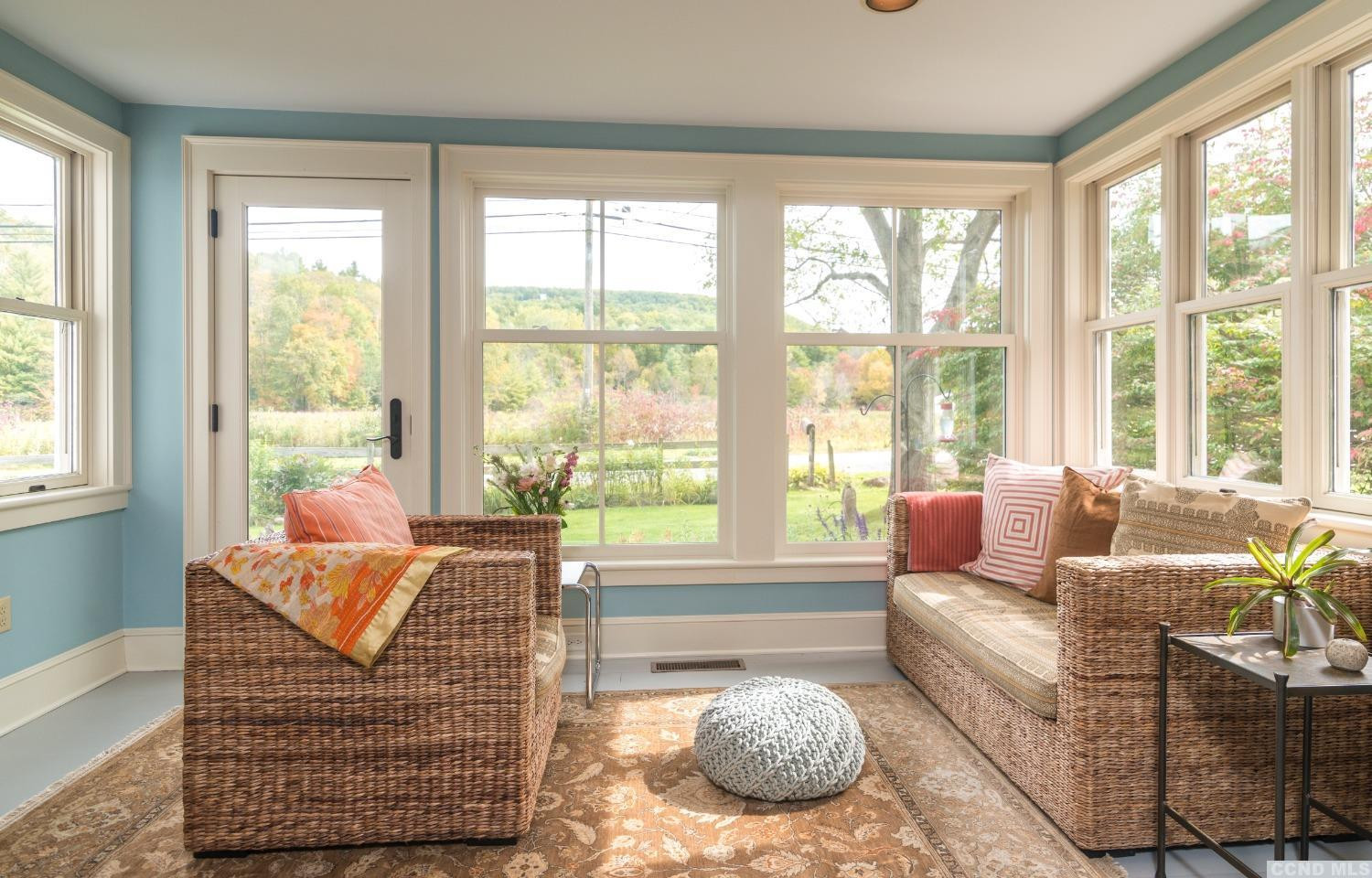 56 Beebe Pond Road Canaan, NY 12029 - Photo 10 of 50 a living room with furniture and floor to ceiling windows