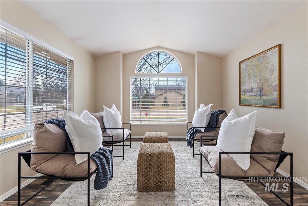 1528 East Peridot Street Meridian, ID 83646 - Photo 11 of 28 Sitting room with lofted ceiling and wood finished floors