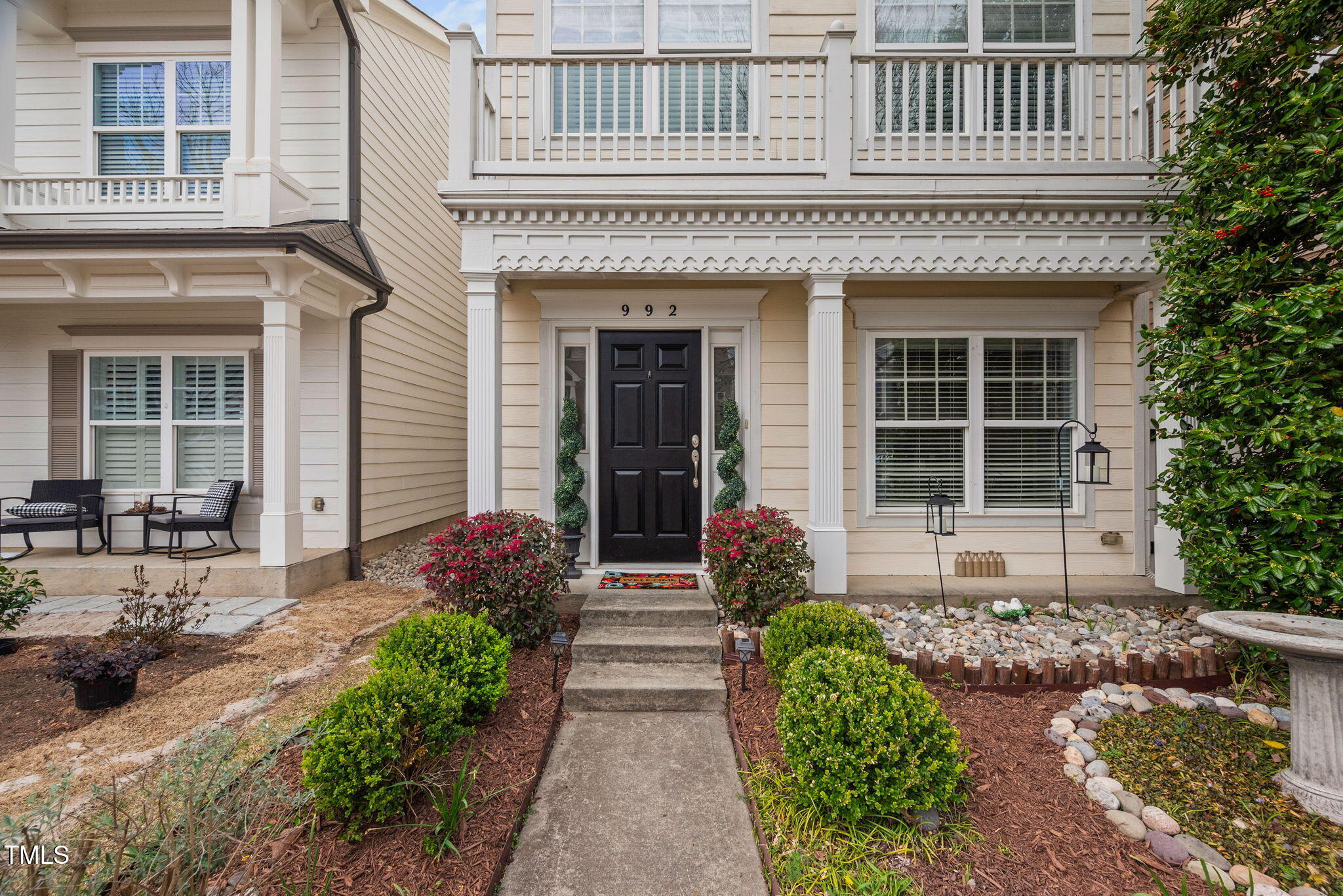 992 Ambergate Apex, NC 27502 - Photo 1 of 39 a front view of a house with garden