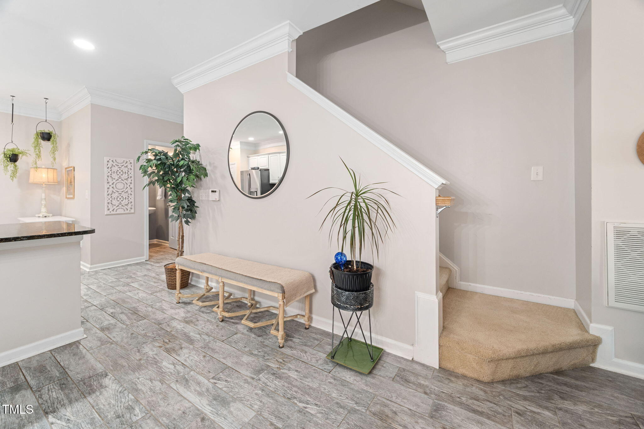 992 Ambergate Apex, NC 27502 - Photo 15 of 39 a living room with furniture a rug and white walls