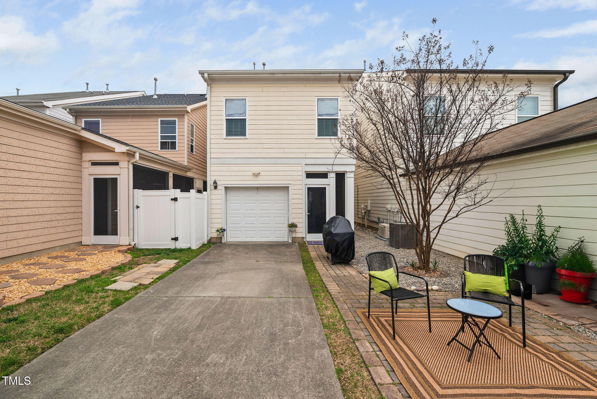 992 Ambergate Apex, NC 27502 - Photo 29 of 39 a view of a house with a patio