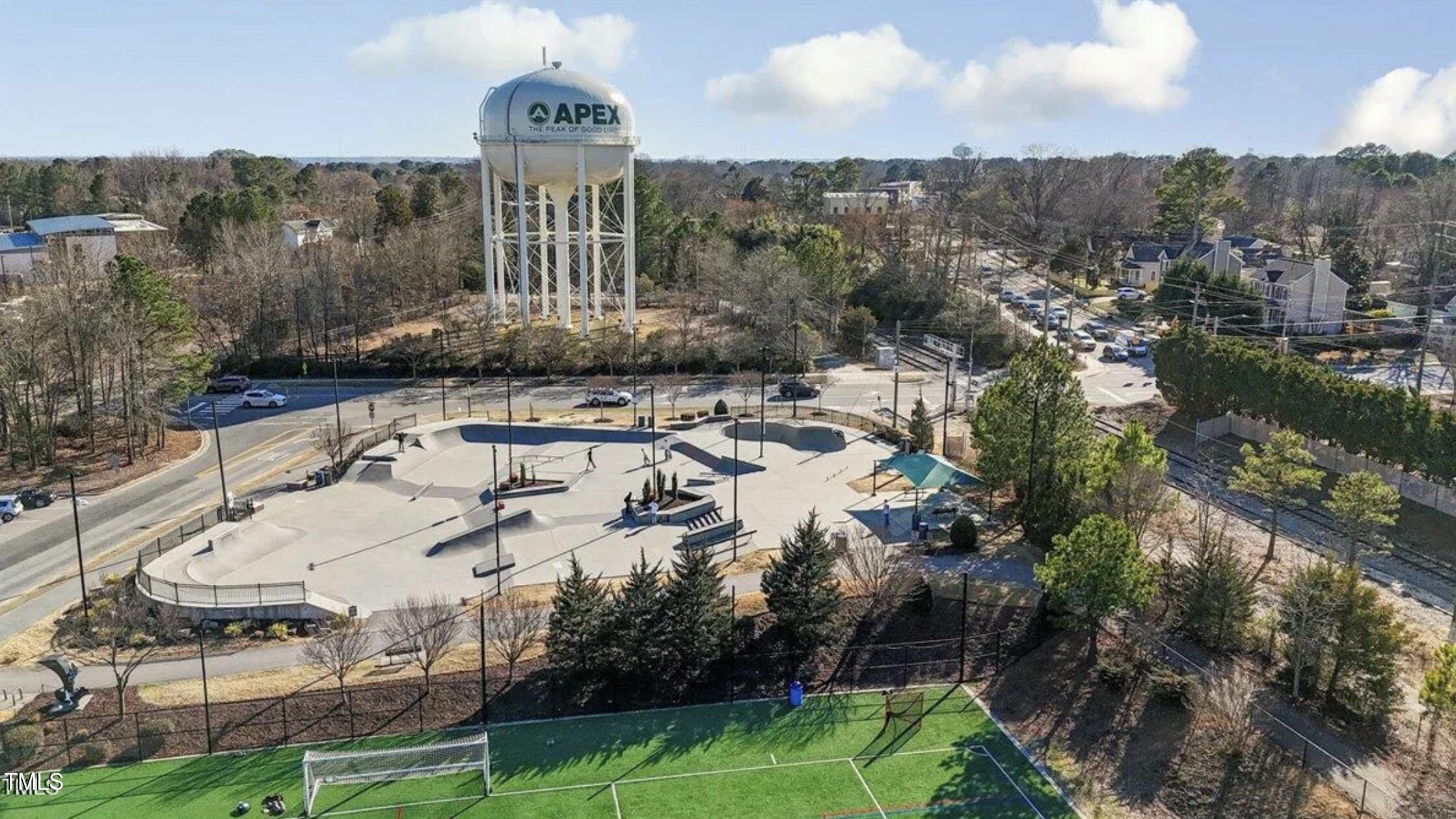 992 Ambergate Apex, NC 27502 - Photo 34 of 39 a view of a chairs and table in a backyard