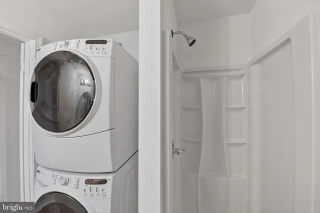 a view of livingroom with washer and dryer