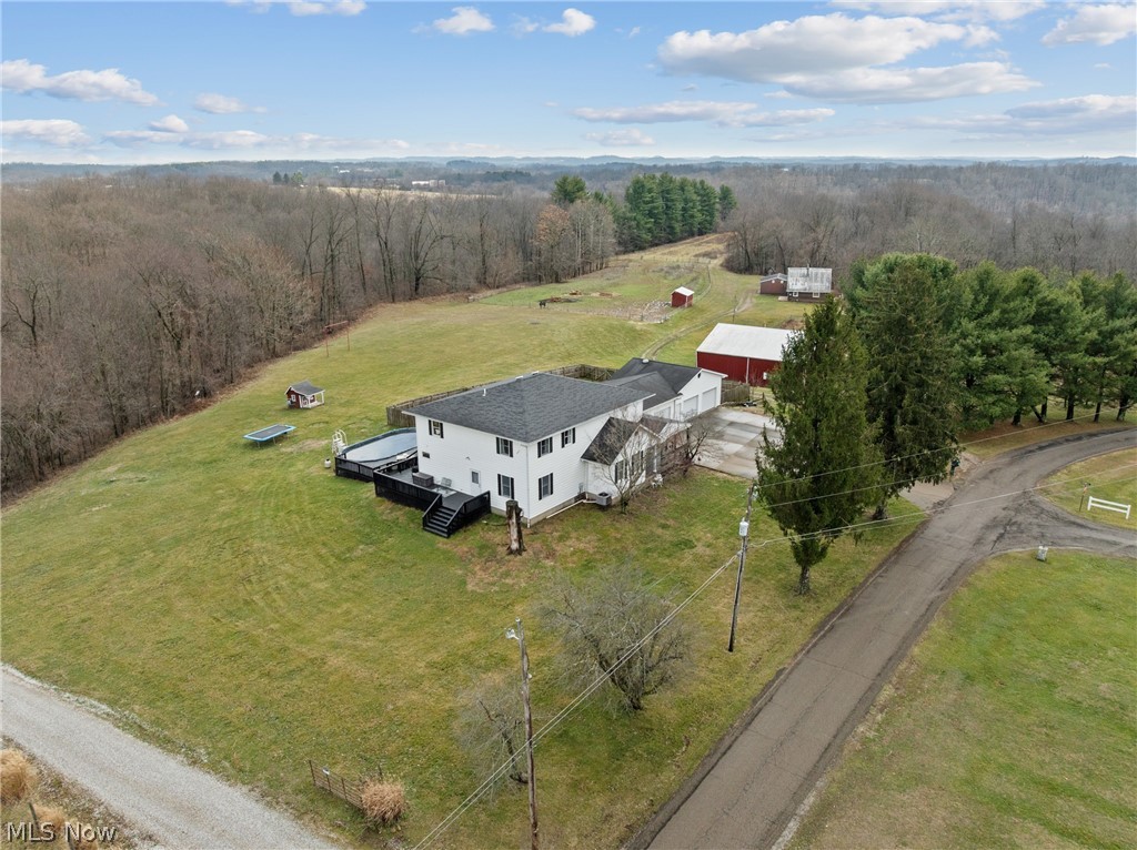 64508 Slade Road Cambridge, OH 43725 - Photo 41 of 50 View of rural area featuring a forest