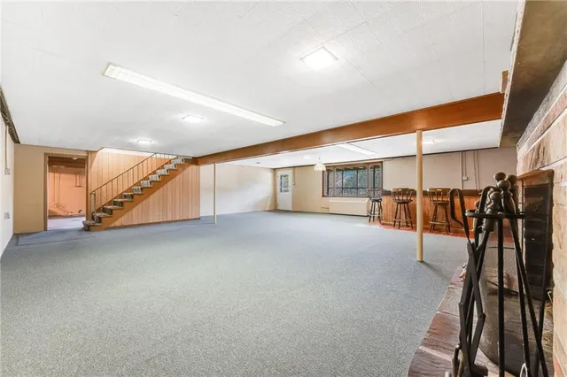 a spacious bathroom with a large tub and sink