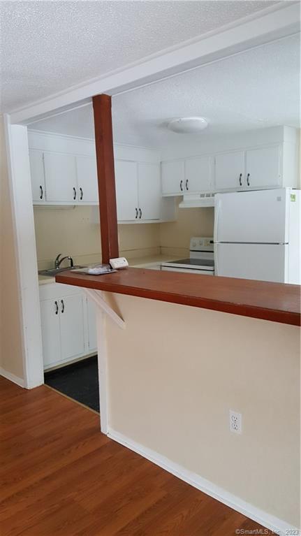 14 White Oak Road, Unit A Mansfield, CT 06250 - Photo 1 of 1 Eat-in Kitchen open to living room