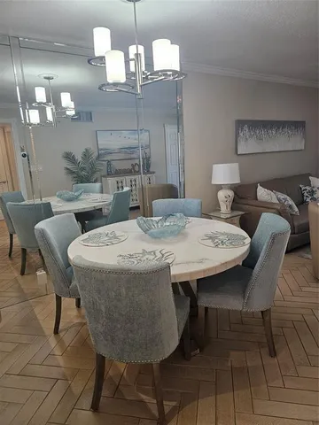 a view of a dining room with furniture