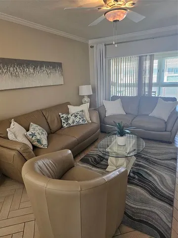 a living room with furniture and a couch