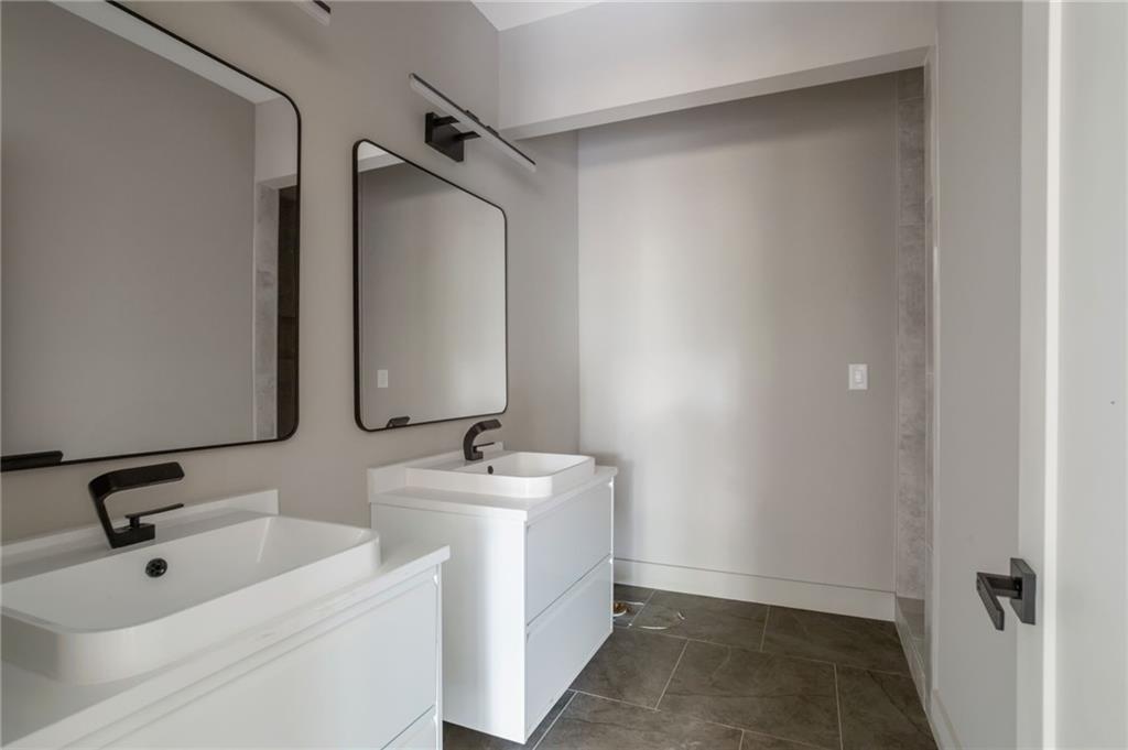 3139 Alston Drive Decatur, GA 30032 - Photo 19 of 40 a bathroom with a sink and mirror