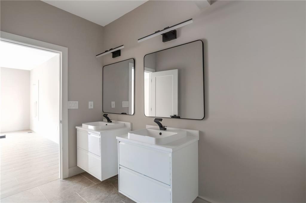 3139 Alston Drive Decatur, GA 30032 - Photo 21 of 40 a bathroom with a sink and a mirror