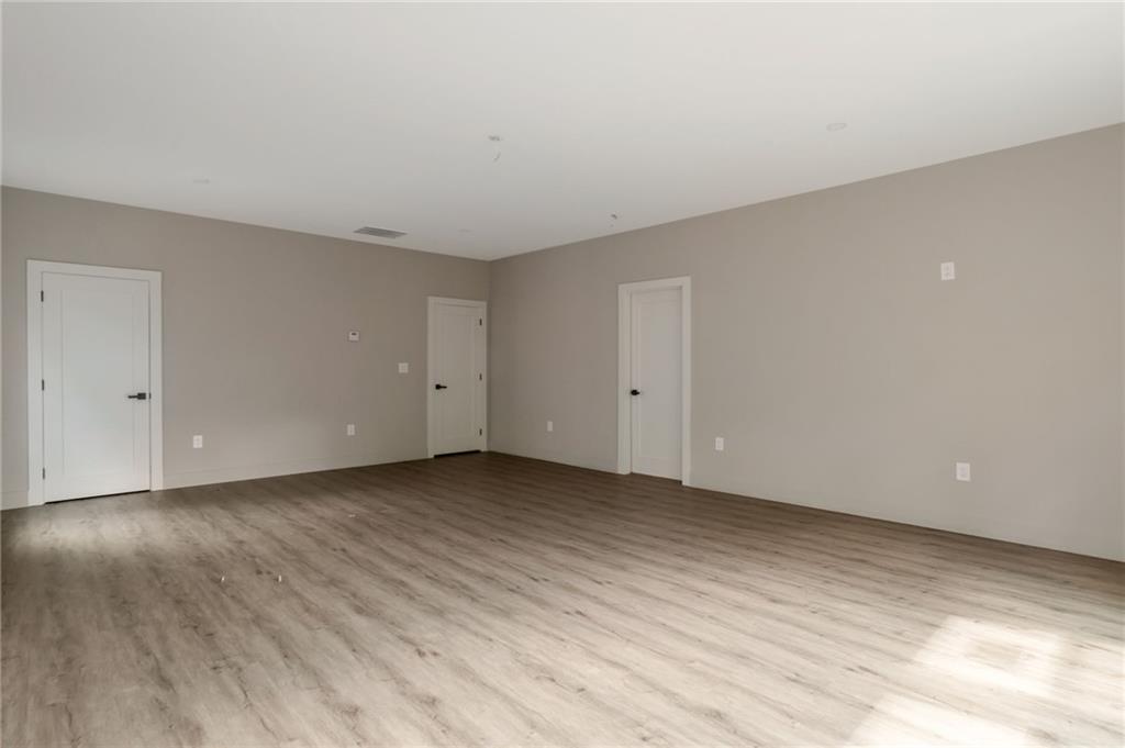 3139 Alston Drive Decatur, GA 30032 - Photo 26 of 40 a view of an empty room and wooden floor