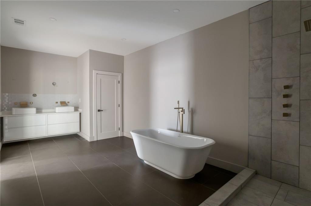 3139 Alston Drive Decatur, GA 30032 - Photo 29 of 40 a bathroom with a sink and a mirror