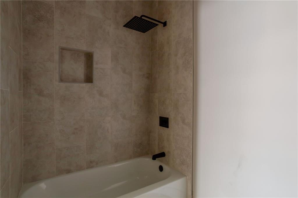 3139 Alston Drive Decatur, GA 30032 - Photo 33 of 40 a bathroom with a bathtub