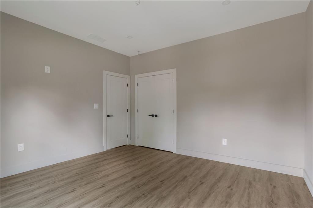 3139 Alston Drive Decatur, GA 30032 - Photo 38 of 40 a view of an empty room with wooden floor