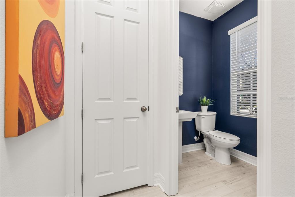 1849 Island Village Way Celebration, FL 34747 - Photo 17 of 50 a bathroom with a toilet and a sink