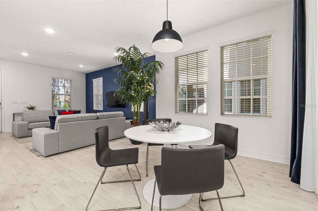 1849 Island Village Way Celebration, FL 34747 - Photo 20 of 50 a dining room with furniture and window