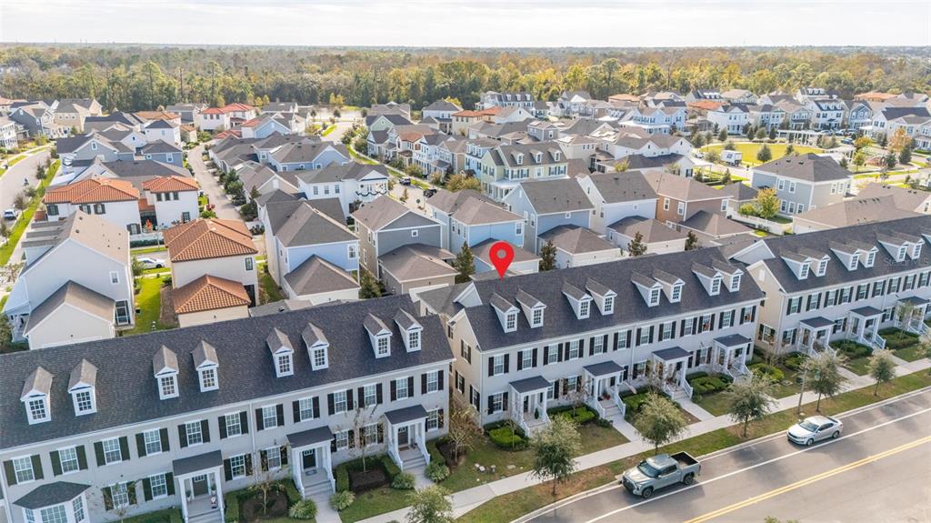 1849 Island Village Way Celebration, FL 34747 - Photo 42 of 50 a view of a city with tall buildings