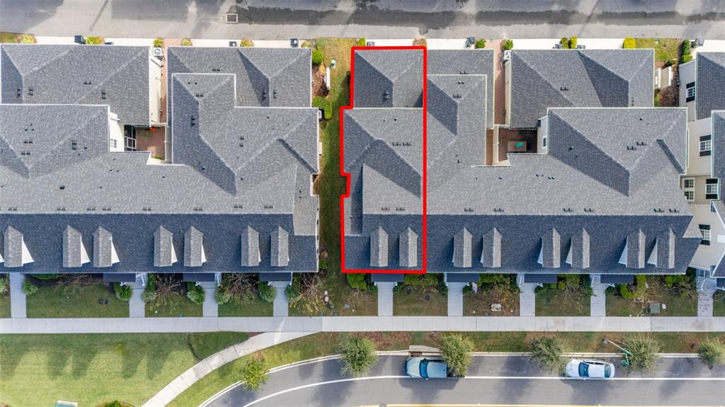 1849 Island Village Way Celebration, FL 34747 - Photo 43 of 50 a view of building with a swimming pool