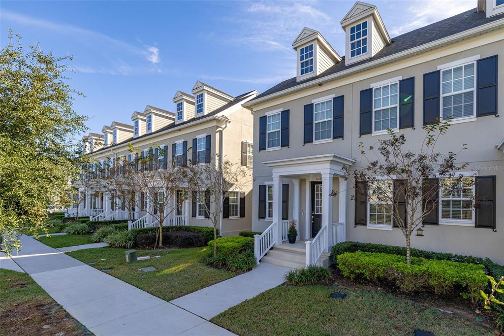 1849 Island Village Way Celebration, FL 34747 - Photo 50 of 50 front view of a house with a yard