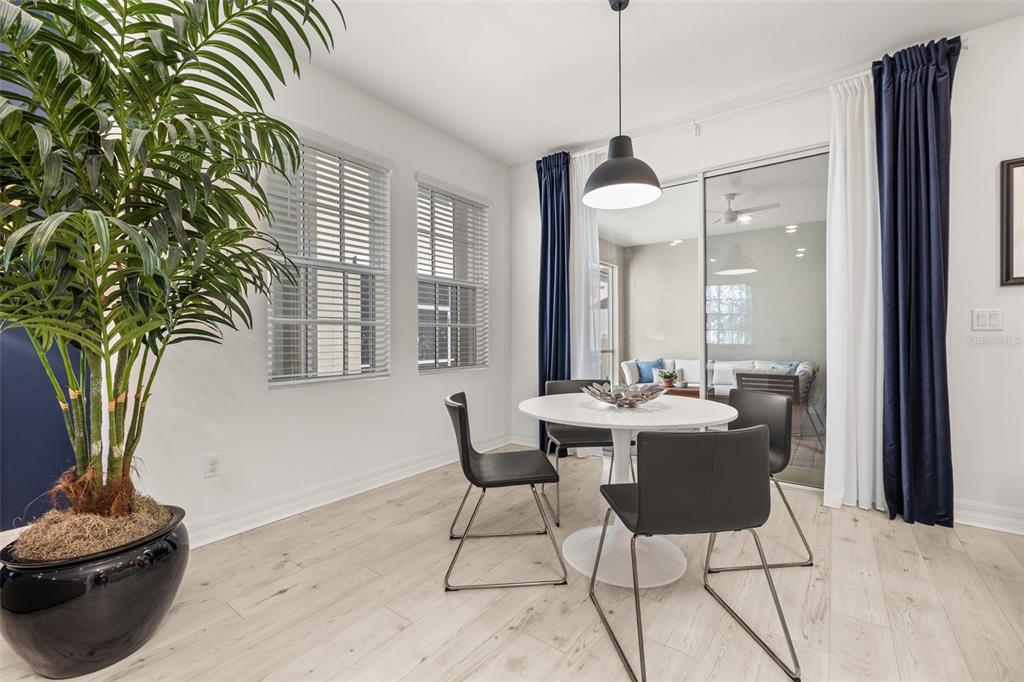 1849 Island Village Way Celebration, FL 34747 - Photo 10 of 50 a dining room with furniture and window