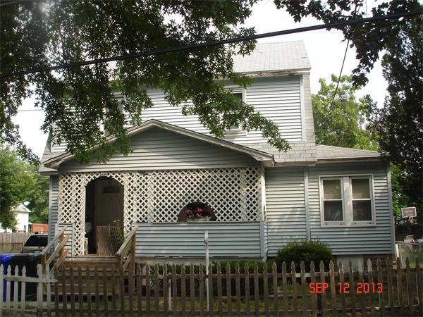 19 Rathbun Street Springfield, MA 01104 - Photo 4 of 5 a front view of a house with a garage