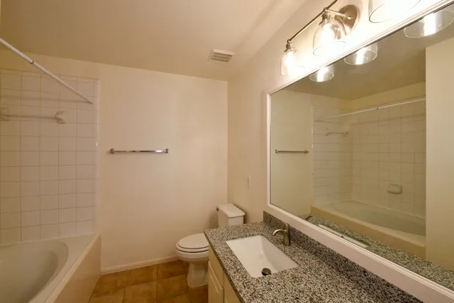 a front view of a house with garage