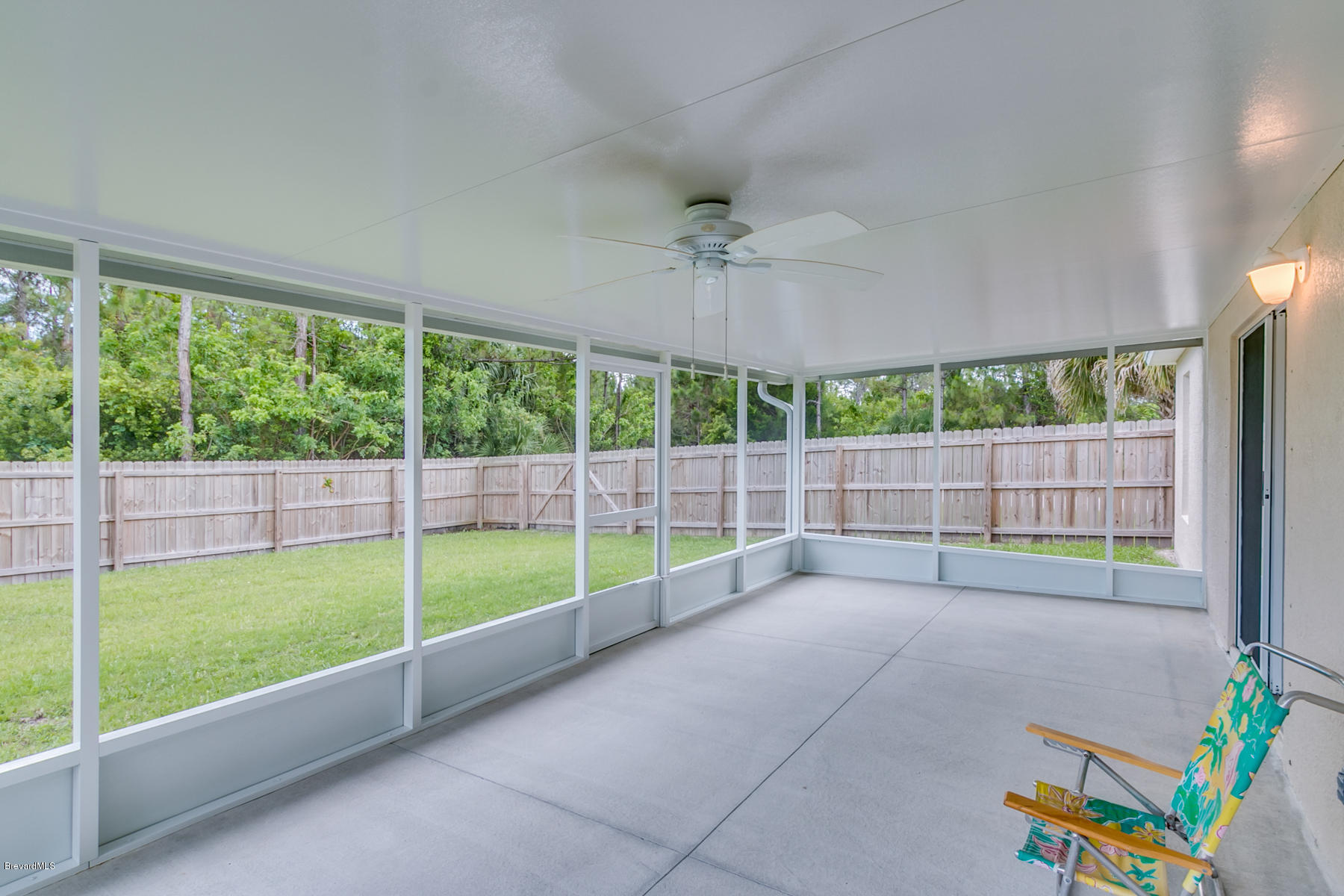 1304 Rabbit Street Southeast Palm Bay, FL 32909 - Photo 4 of 37 a view of a room with windows