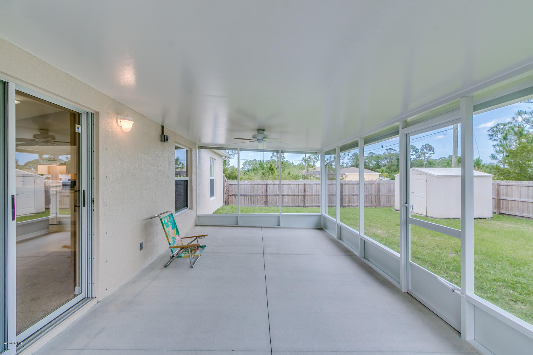 1304 Rabbit Street Southeast Palm Bay, FL 32909 - Photo 9 of 37 a view of a room window and outdoor space