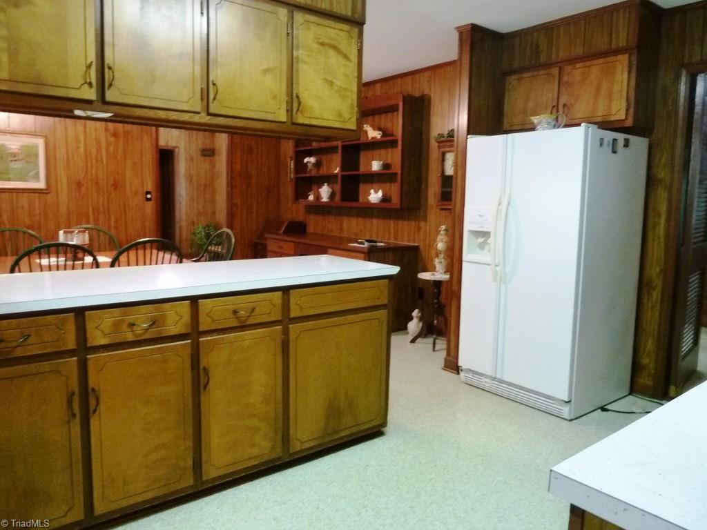 142 Jack Young Road Lexington, NC 27292 - Photo 7 of 30 Ktchen is open to informal dining room. Refrigerator is included.
