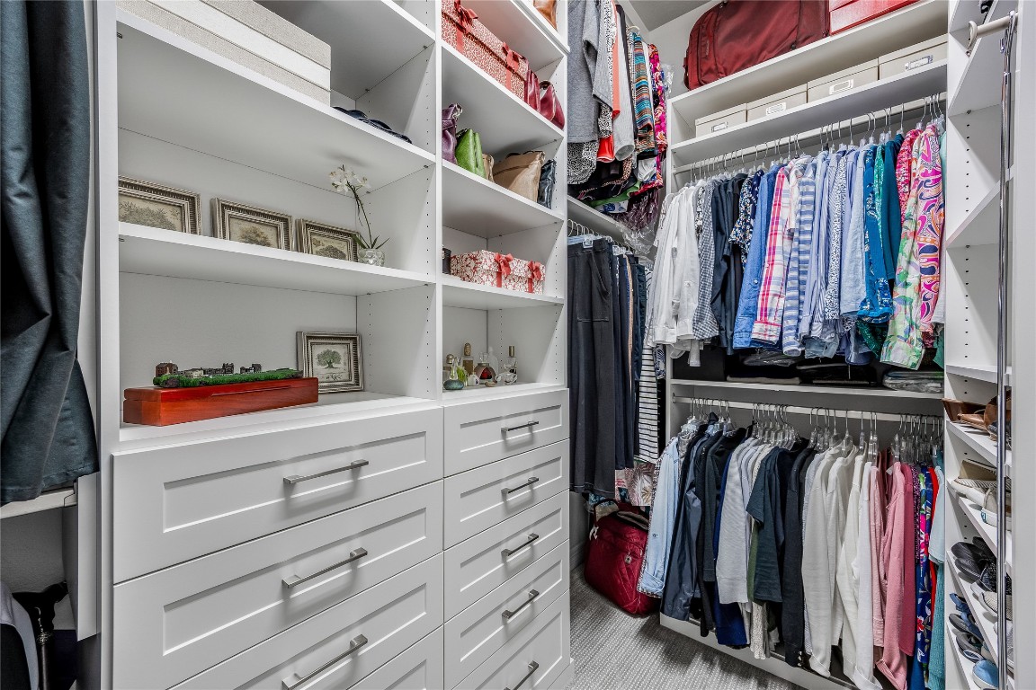 2930 Grand Oaks Loop, Unit 2901 Cedar Park, TX 78613 - Photo 21 of 33 a view of walk in closet with clothes and shoes