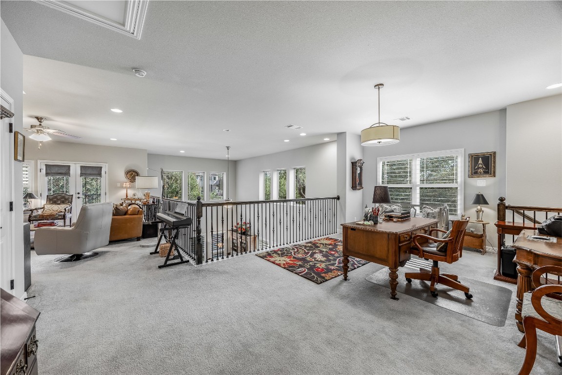 2930 Grand Oaks Loop, Unit 2901 Cedar Park, TX 78613 - Photo 22 of 33 a living room with furniture and a large window