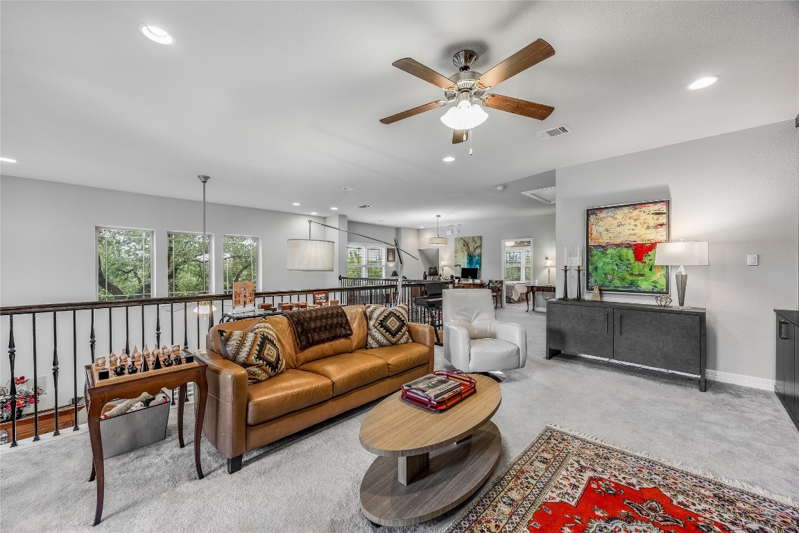 2930 Grand Oaks Loop, Unit 2901 Cedar Park, TX 78613 - Photo 25 of 33 a living room with furniture and a large window