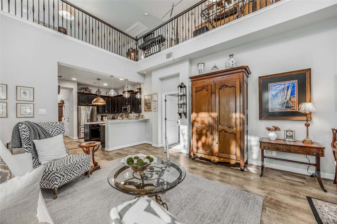 2930 Grand Oaks Loop, Unit 2901 Cedar Park, TX 78613 - Photo 3 of 33 a living room with furniture and wooden floor