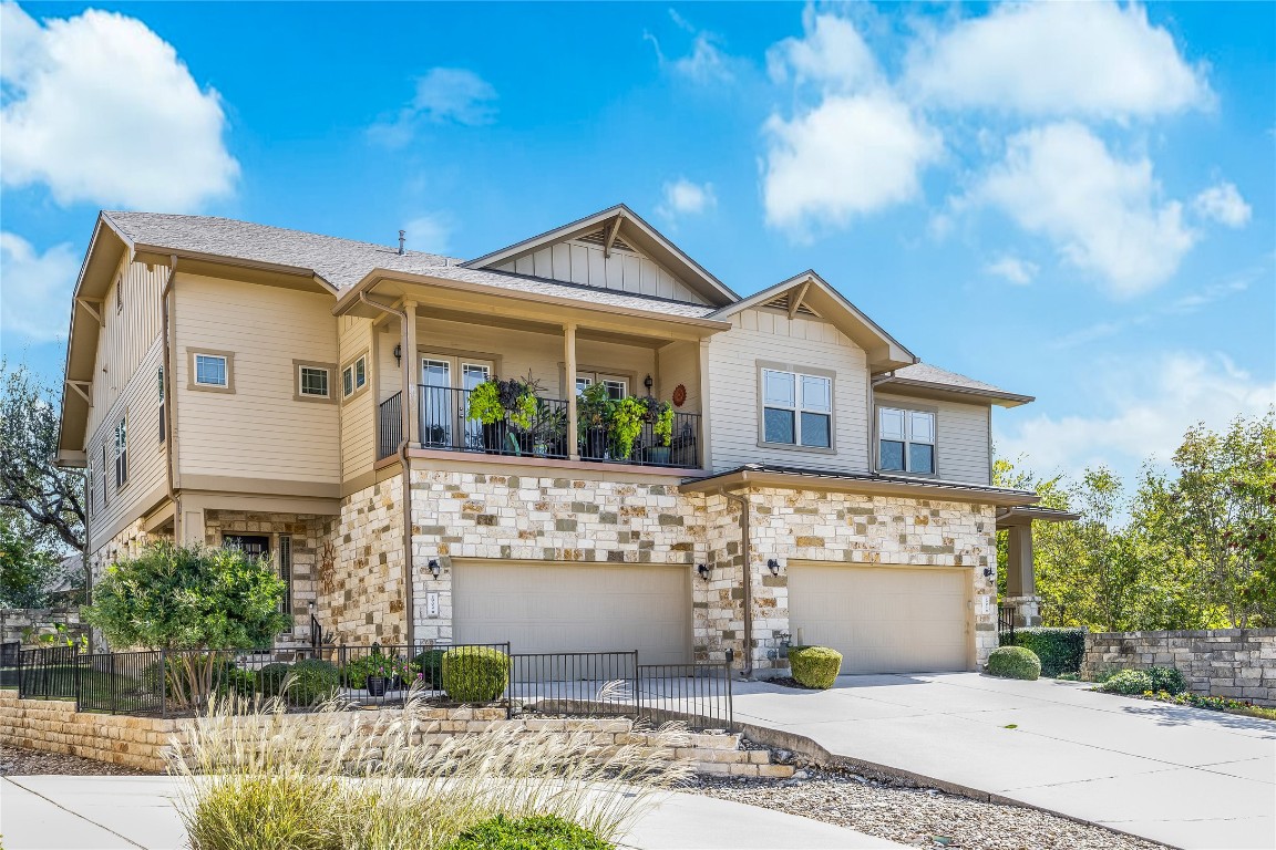 2930 Grand Oaks Loop, Unit 2901 Cedar Park, TX 78613 - Photo 7 of 33 a front view of a house with garden