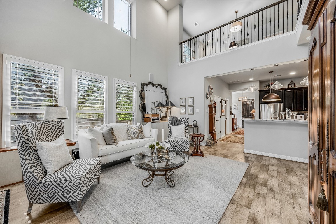 2930 Grand Oaks Loop, Unit 2901 Cedar Park, TX 78613 - Photo 10 of 33 a living room with furniture and a large window