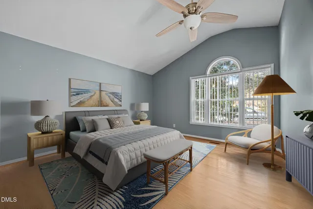 a white bath tub sitting in a bathroom next to a window