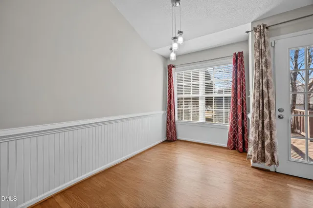 a view of a outdoor space with a large tree