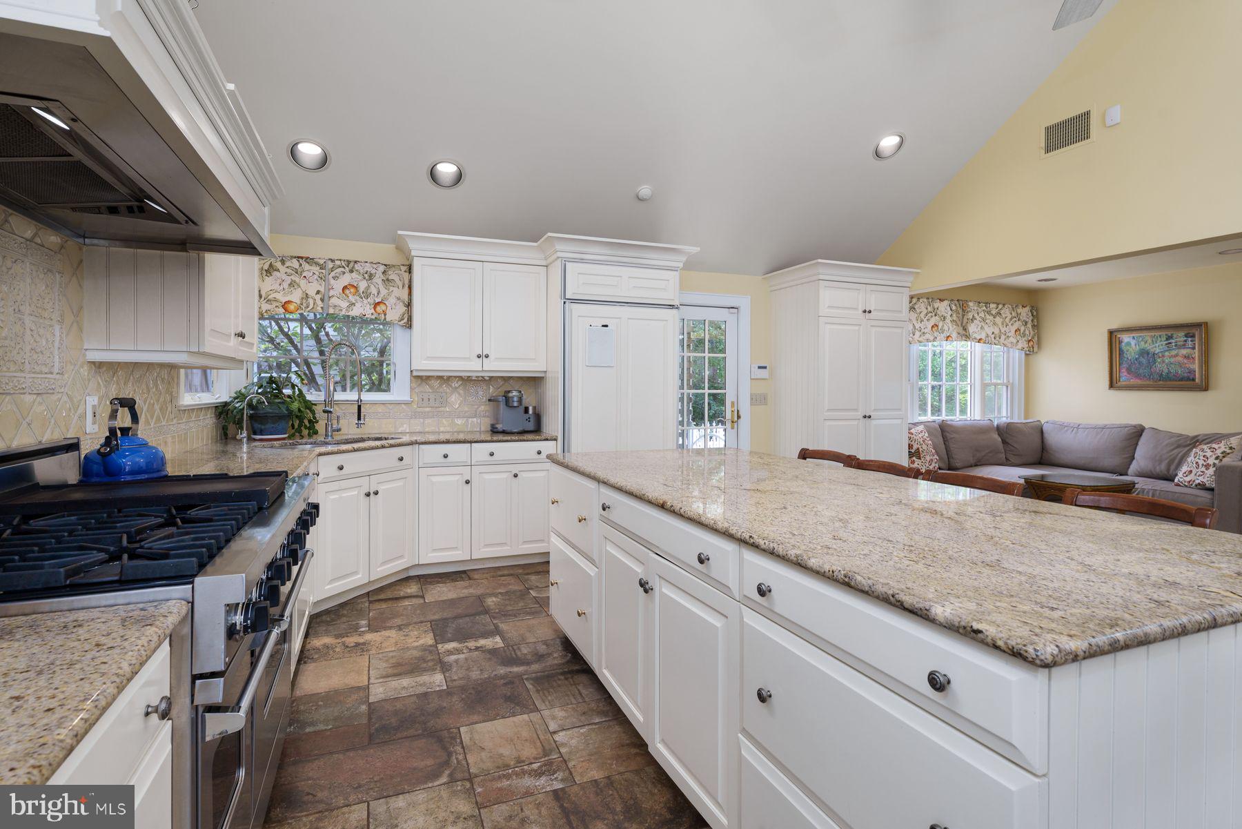 821 Pretty Brook Road Princeton, NJ 08540 - Photo 16 of 32 a large kitchen with granite countertop a sink and cabinets