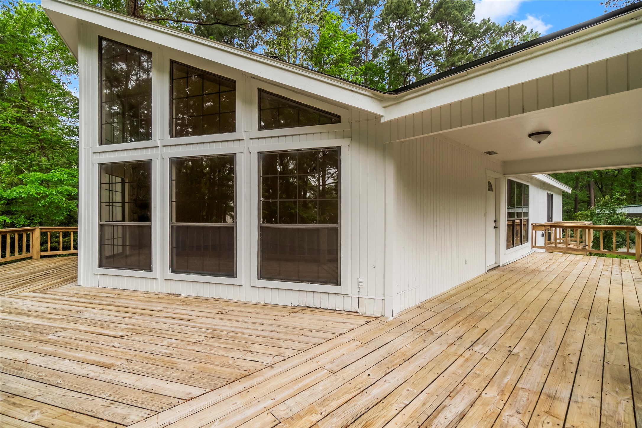 200 Johnson Road Coldspring, TX 77331 - Photo 15 of 49 a view of a house with a large window