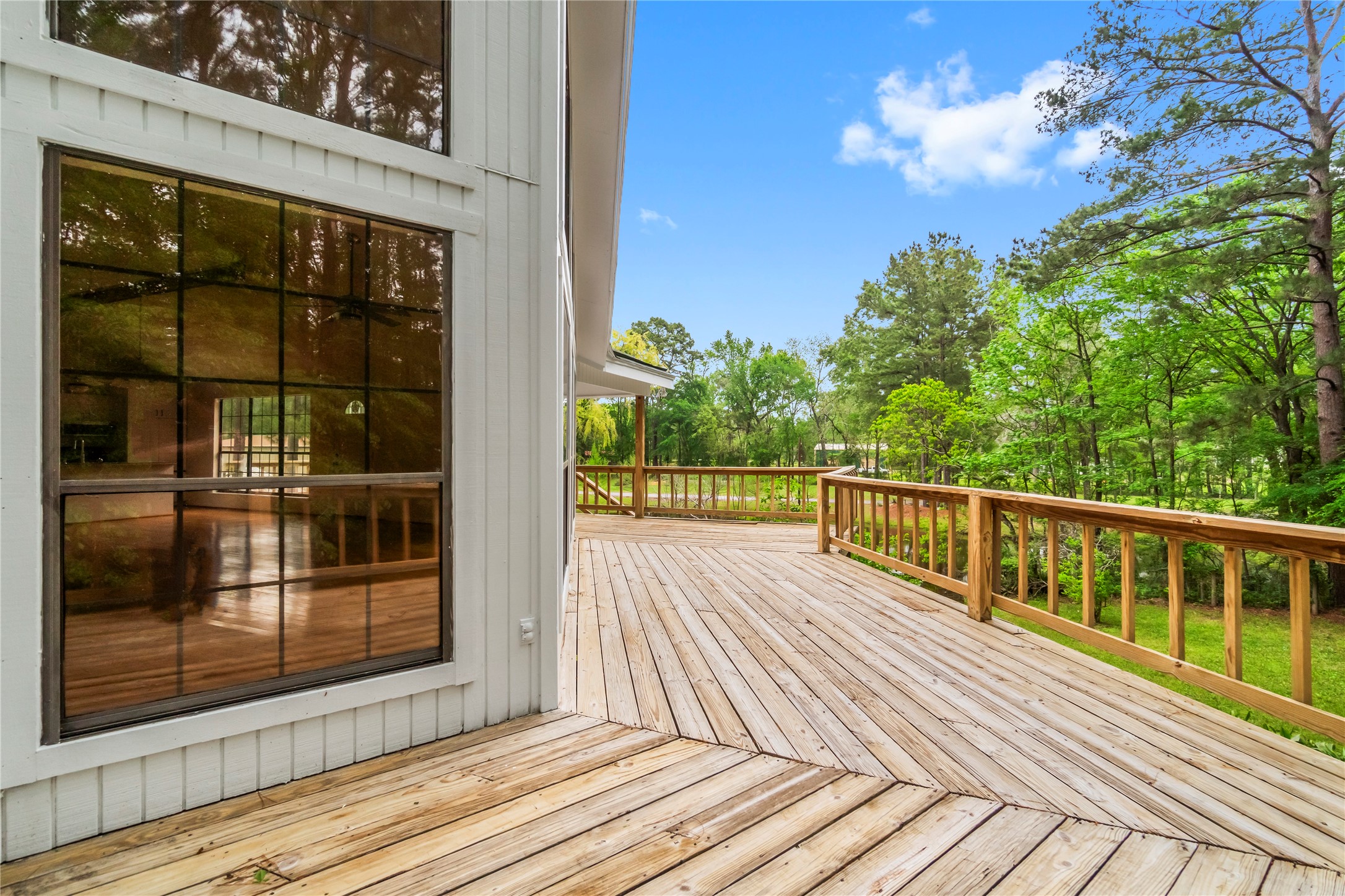 200 Johnson Road Coldspring, TX 77331 - Photo 16 of 49 a view of balcony with wooden floor