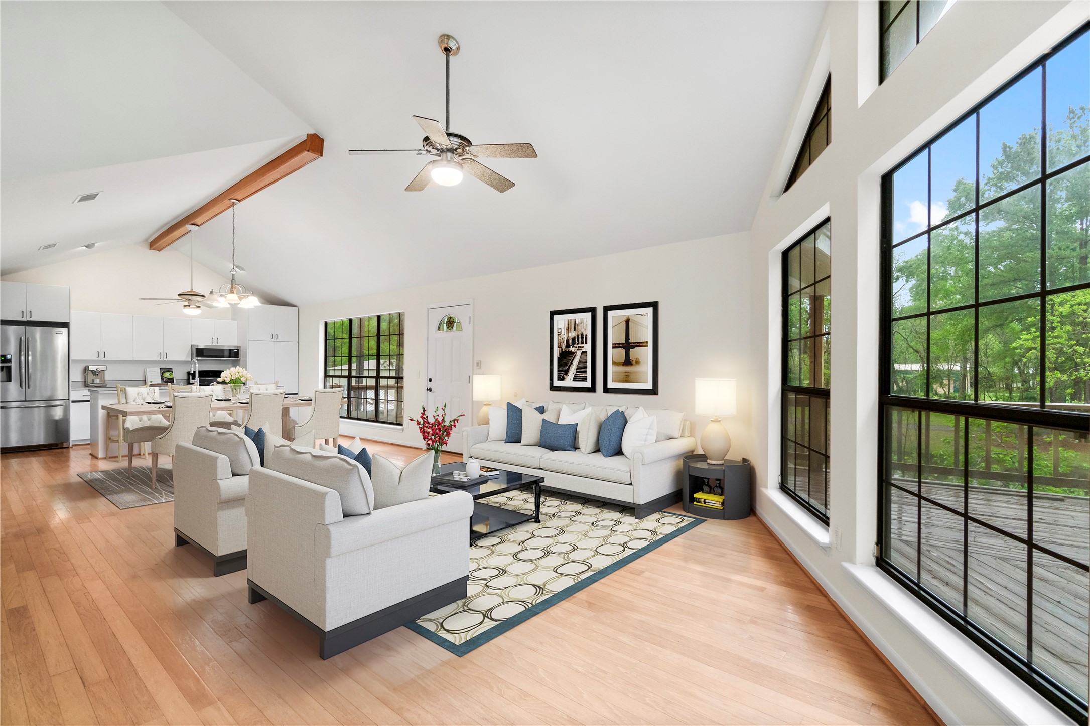 200 Johnson Road Coldspring, TX 77331 - Photo 24 of 49 a living room with furniture large window and wooden floor