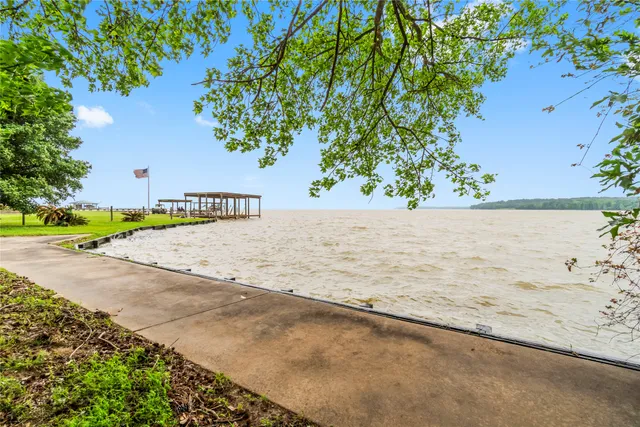 a view of a lake and green space