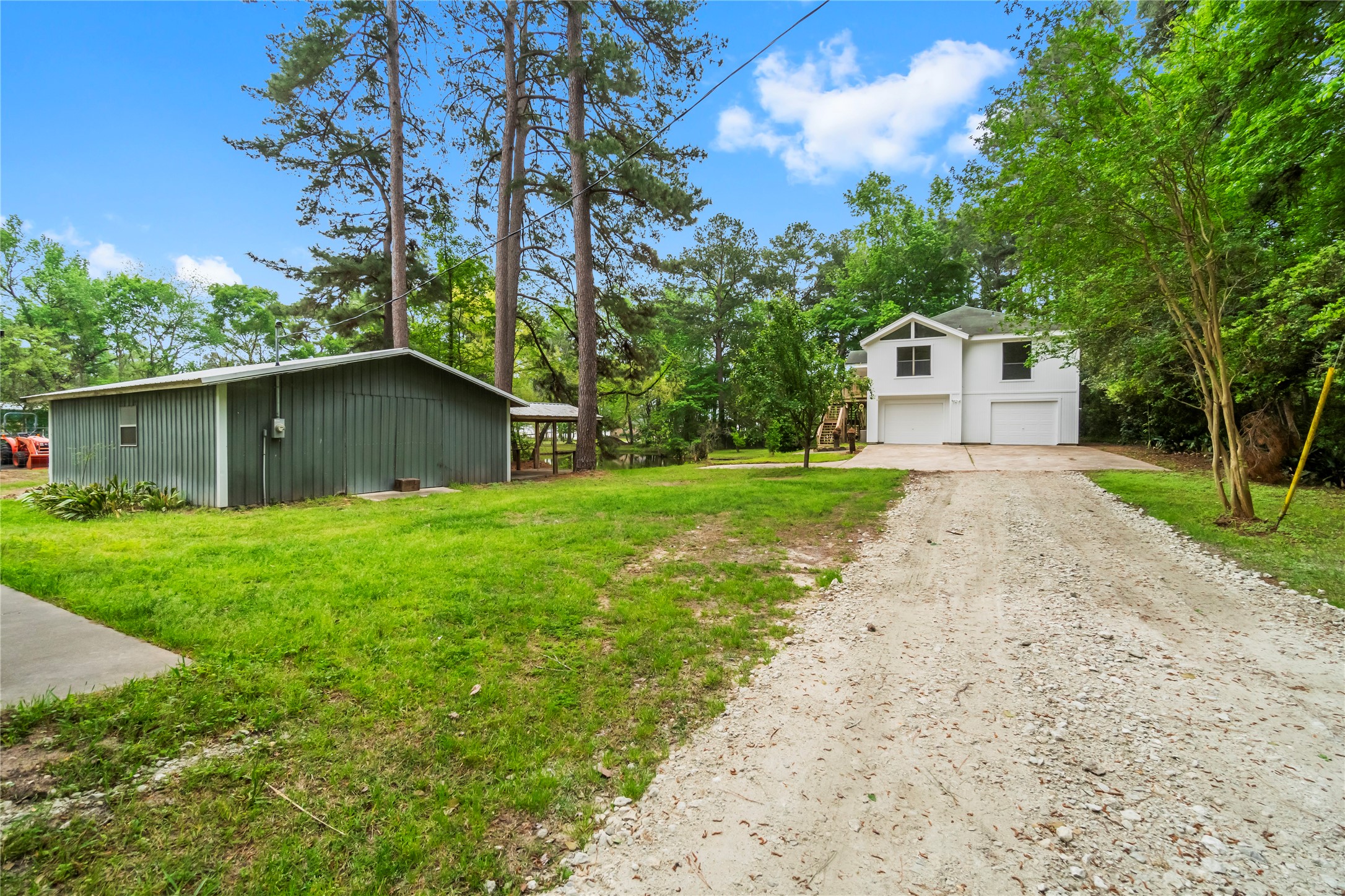 200 Johnson Road Coldspring, TX 77331 - Photo 5 of 49 a front view of house with yard and trees