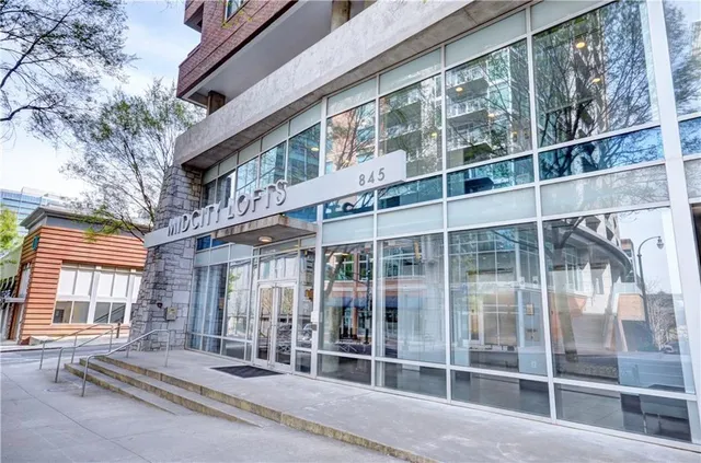 a building exterior with two windows