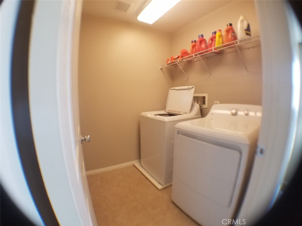 1688 Julia Way Riverside, CA 92501 - Photo 11 of 36 a utility room with dryer and washer